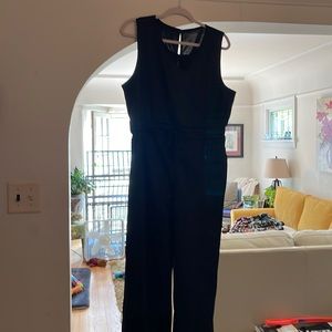 Black jumpsuit that is a like Oprah jumpsuit
